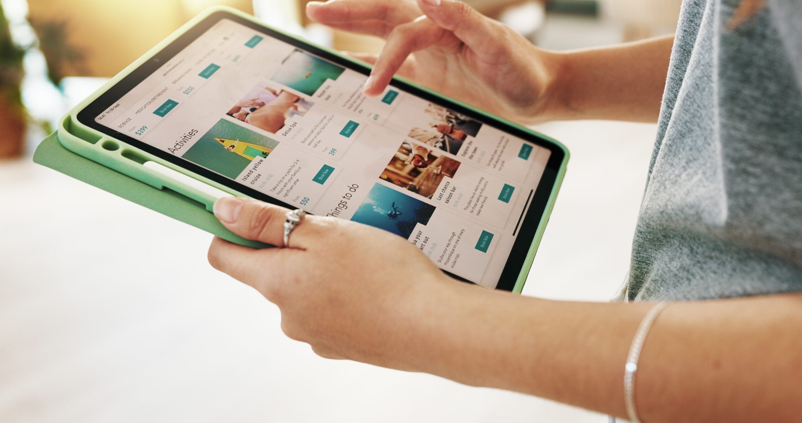 Hands,,Person,And,Tablet,Screen,With,Booking,On,Website,For